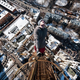 Illustration for article titled Crazy Guy Dangles Above the Earth at Terrifying Heights